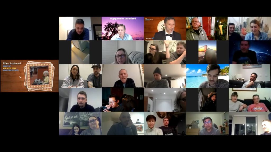 Remote team laughing together during a virtual team building trivia game