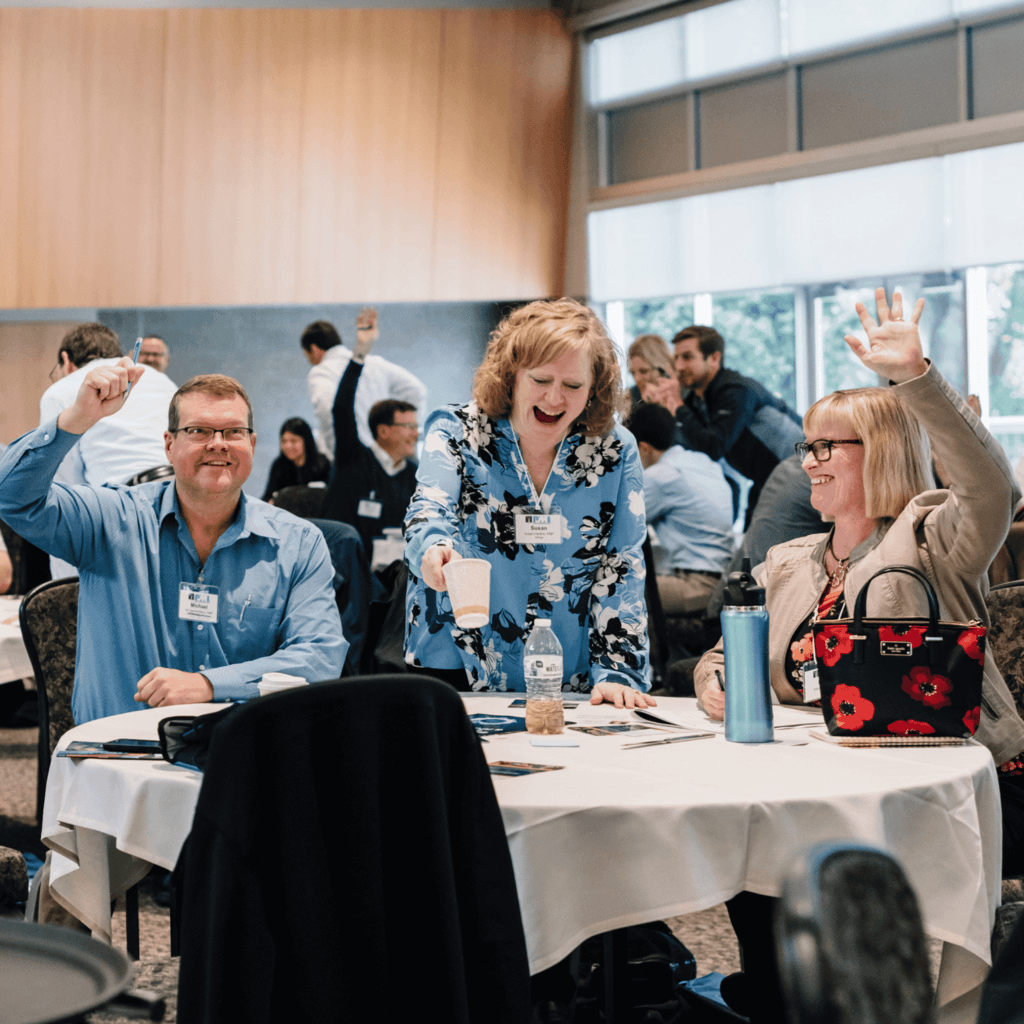 Audience-interaction-laughing-hands-up-corporate team building, keynote speakers and emcees, Vancouver