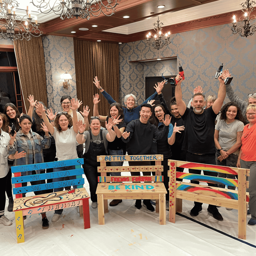 Buddy-bench-excited-group-from-entree-corporate team building, keynote speakers and emcees, Vancouver