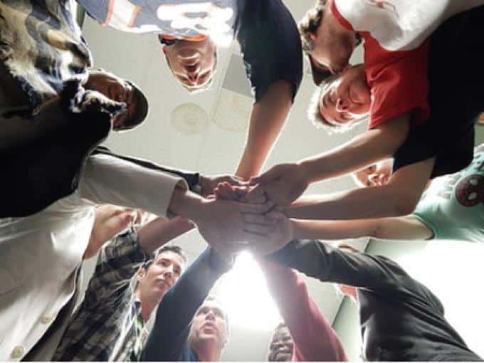 Team building — hands-in huddle