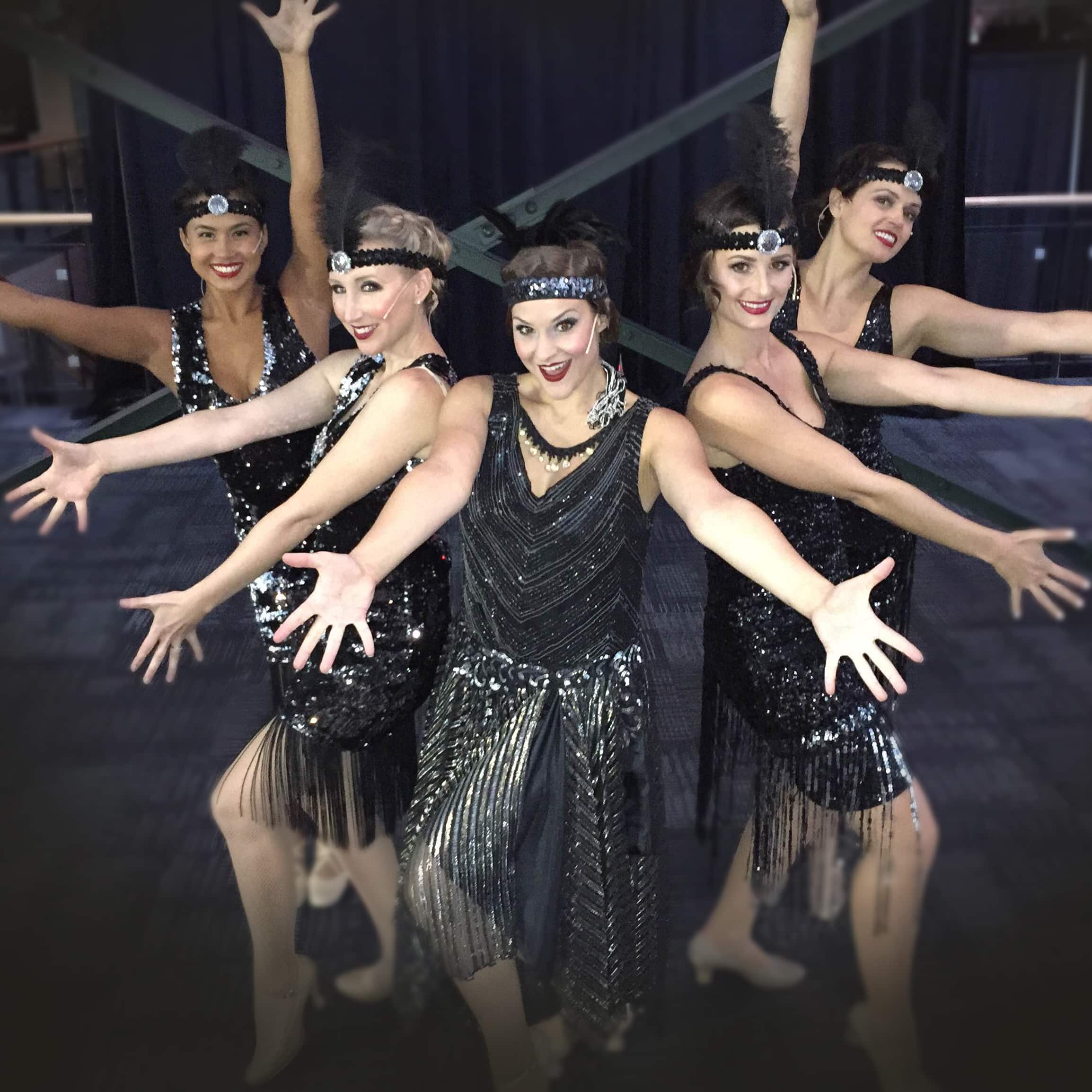 1920s flapper performers at a themed corporate event