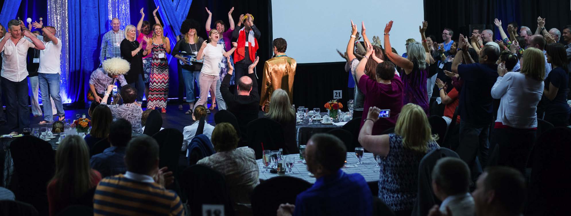 Contestants compete during a Name That Tune round