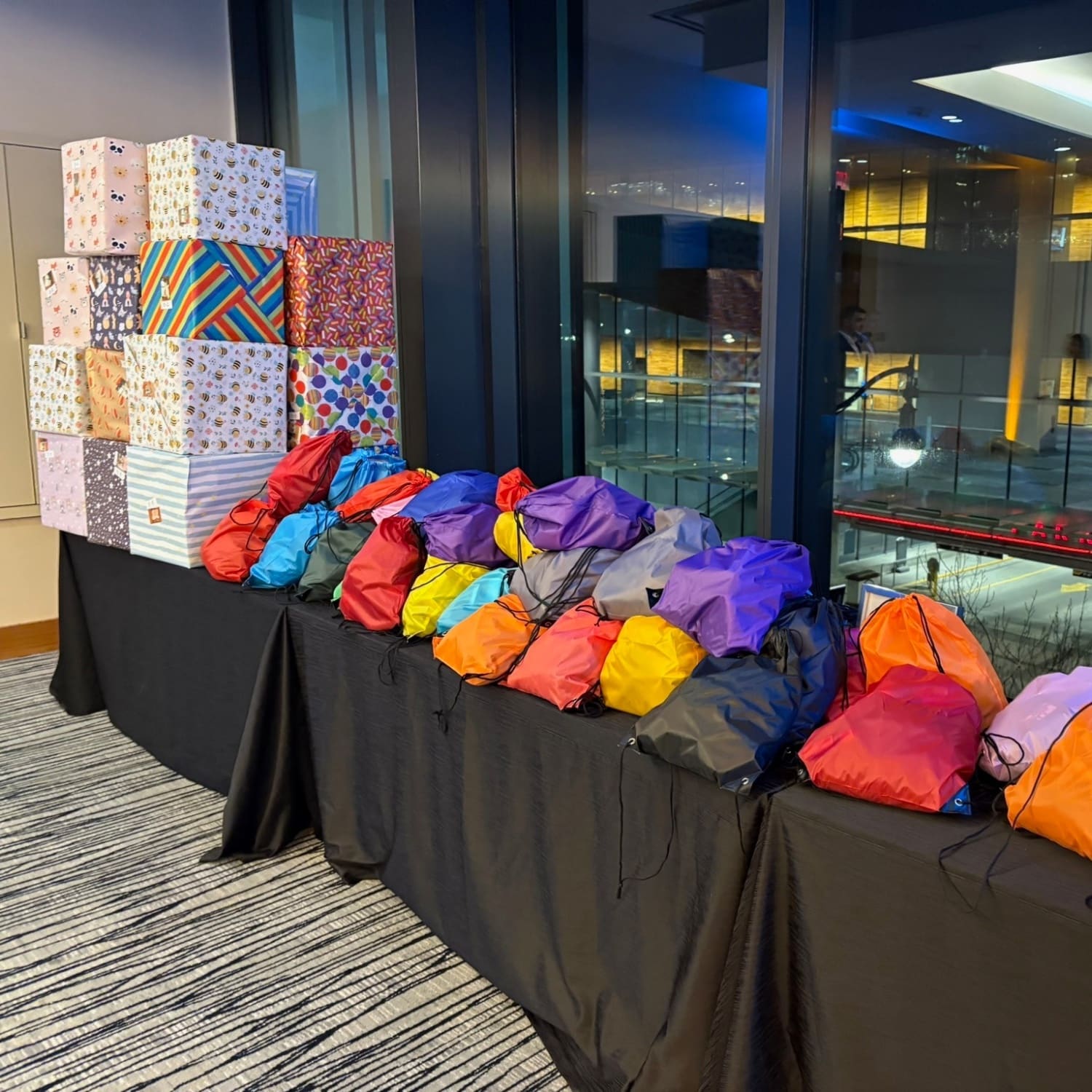 A completed batch of Kindness Kits packaged and ready to donate