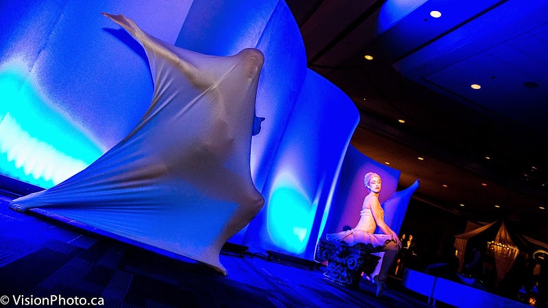A lycra-suited dancer performs an abstract movement routine