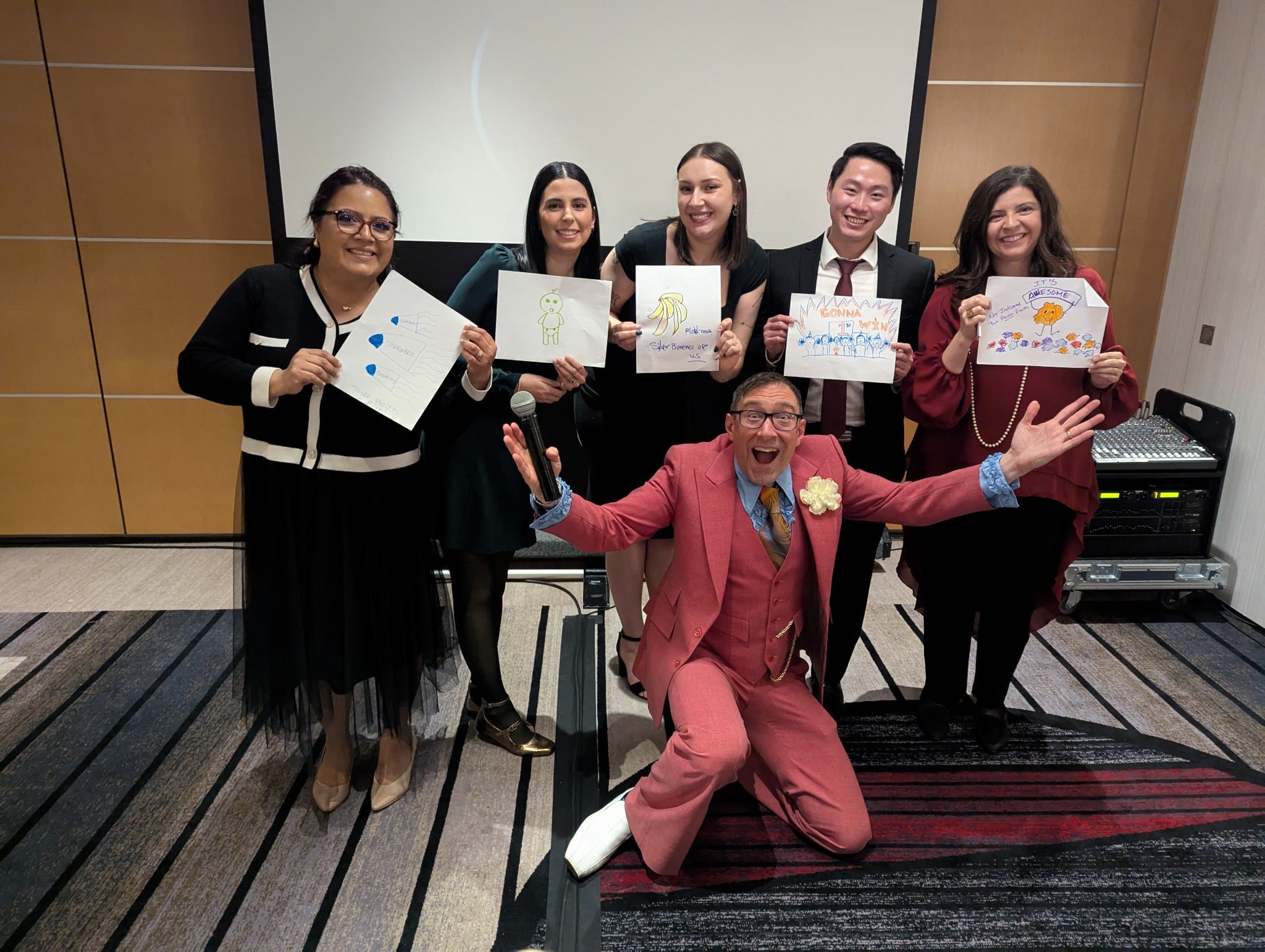 The winning team celebrates at the end of a POP Trivia game