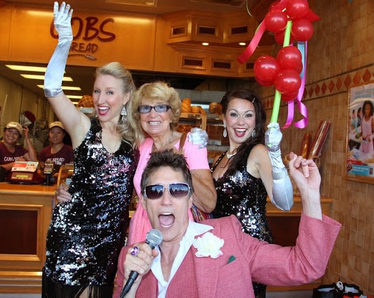Employees react with surprise as the Prize Patrol arrives