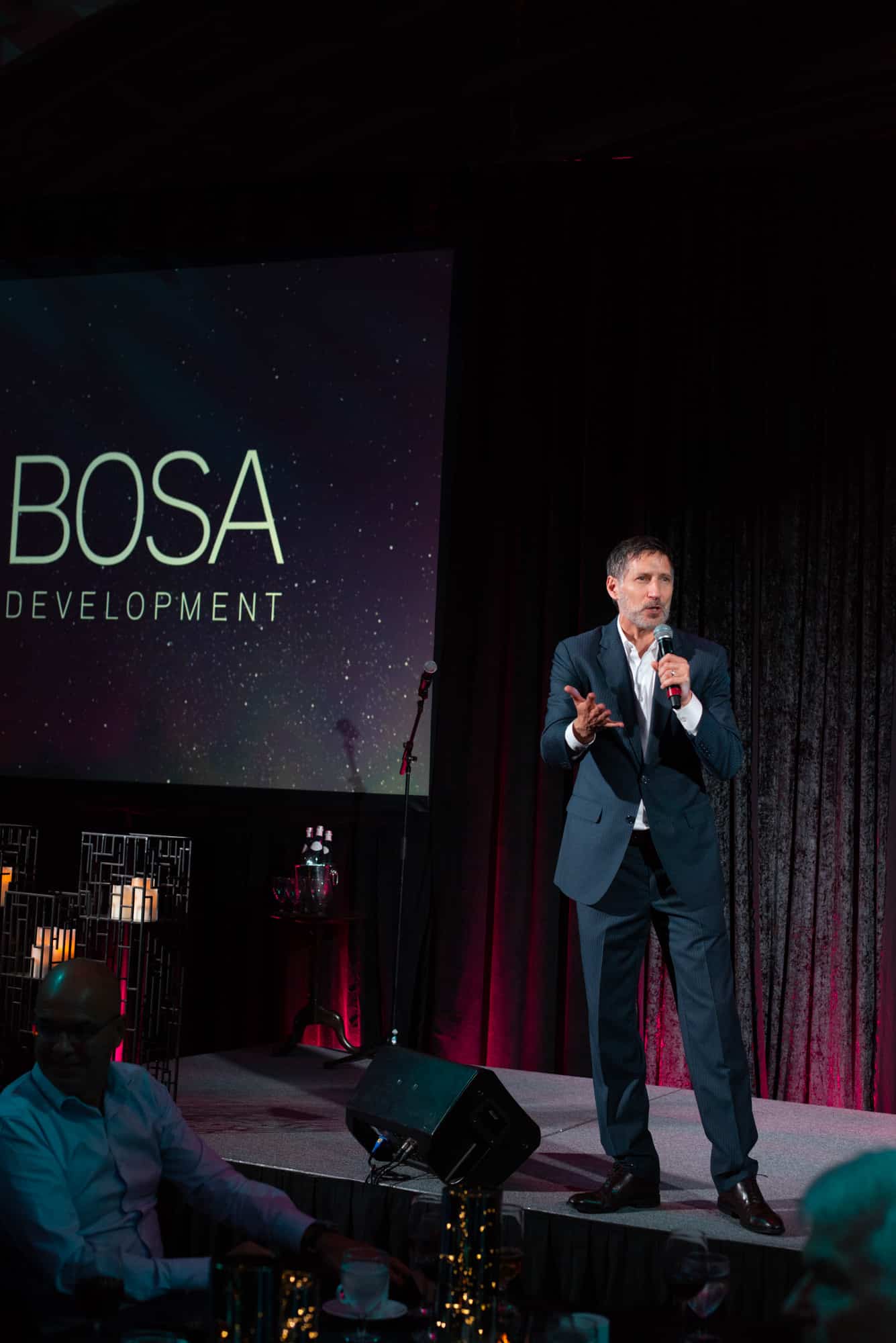 Roger emcees an event for Bosa Properties