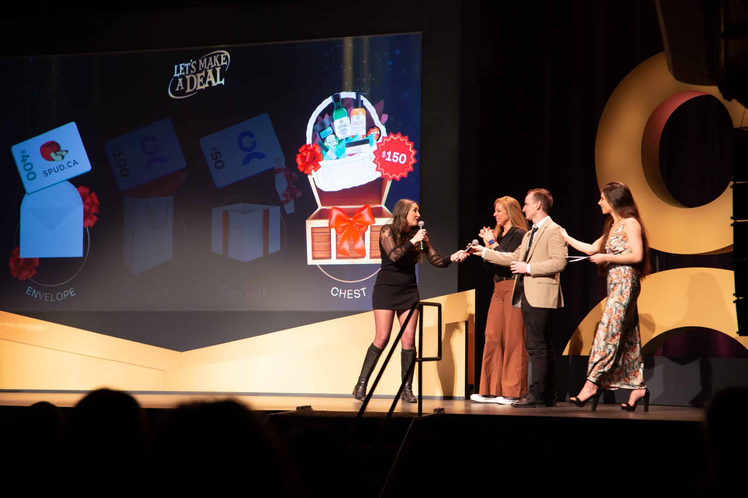 Emcee Sarah Dawn hosts a corporate event