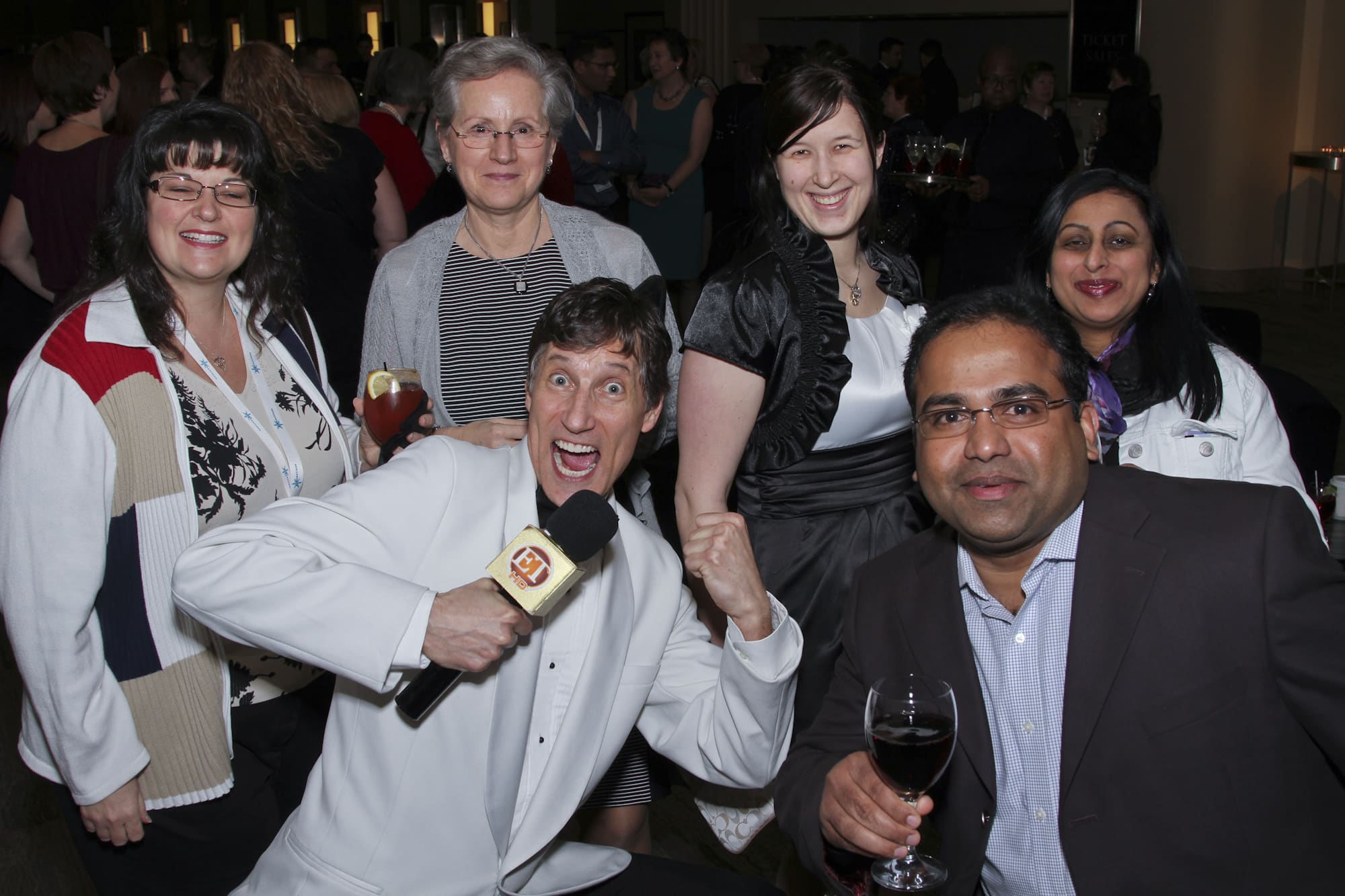 The room reacts during the Walmart Toronto gala dinner program