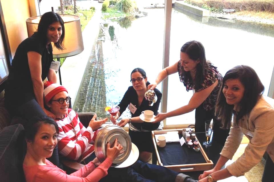 A team hunts for the Where's Waldo clue at a Westin weekend event